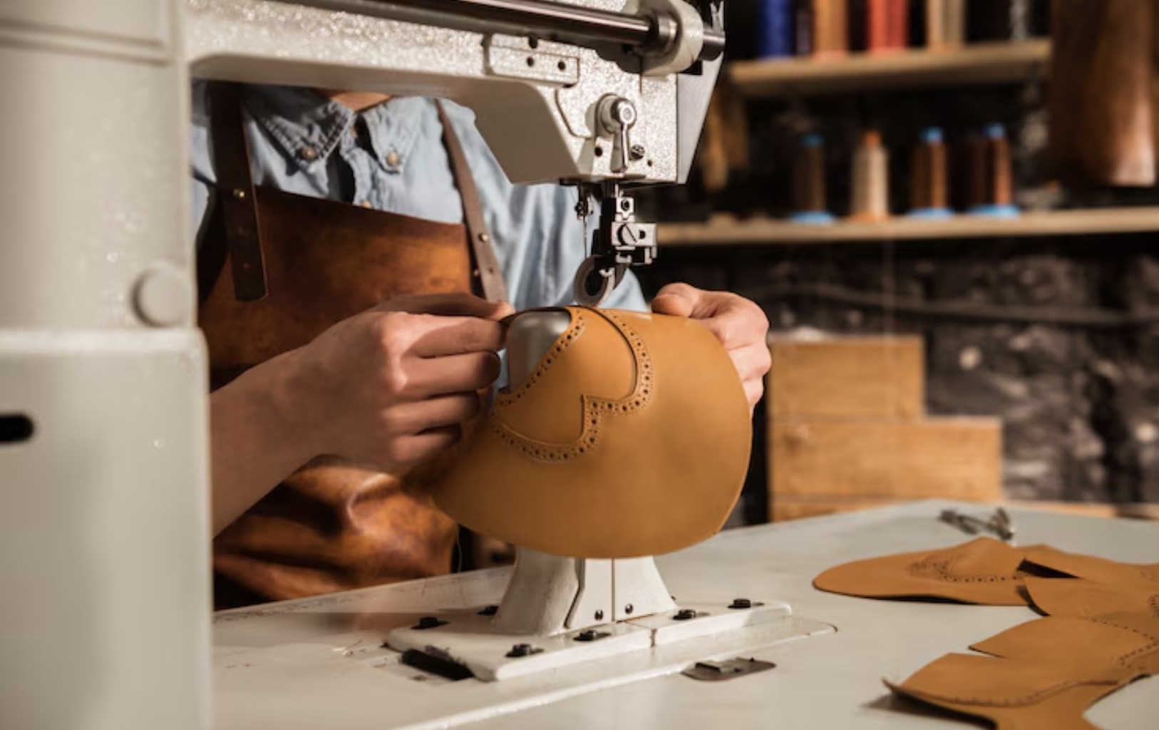 Close-up of fine stitching and metal detailing on a luxury-style handbag Close-up of fine stitching and metal detailing on a luxury-style handbag