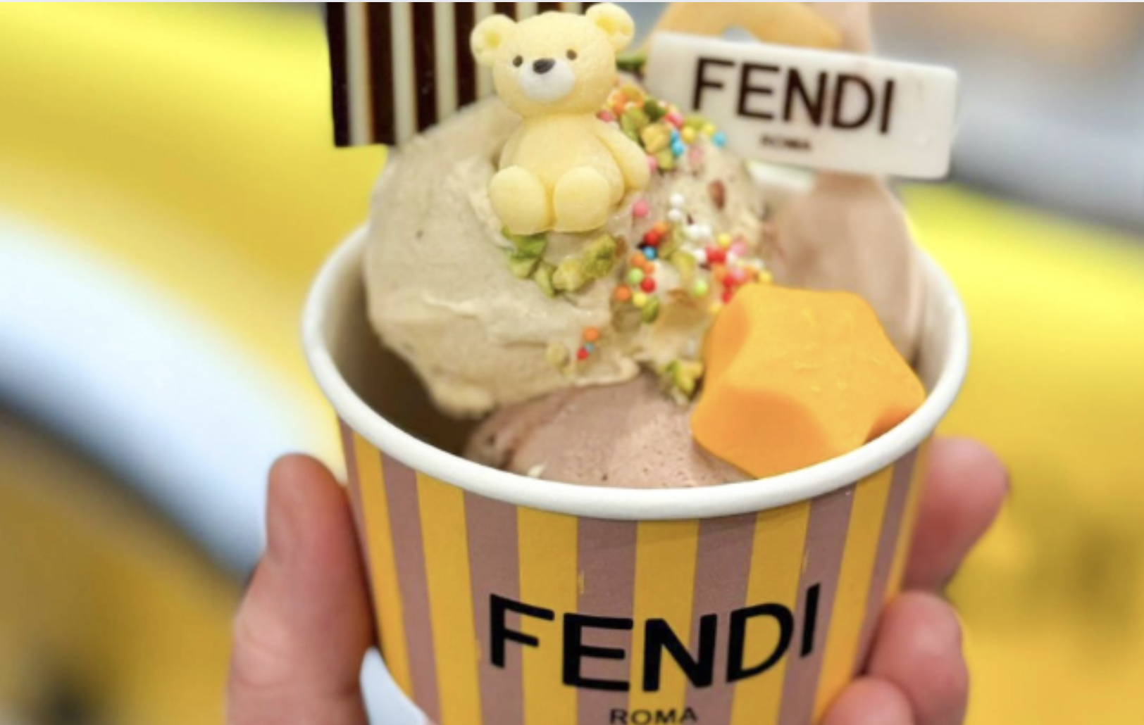  Fashion influencer takes a bite of branded FENDI gelato cone outside a Seoul department store