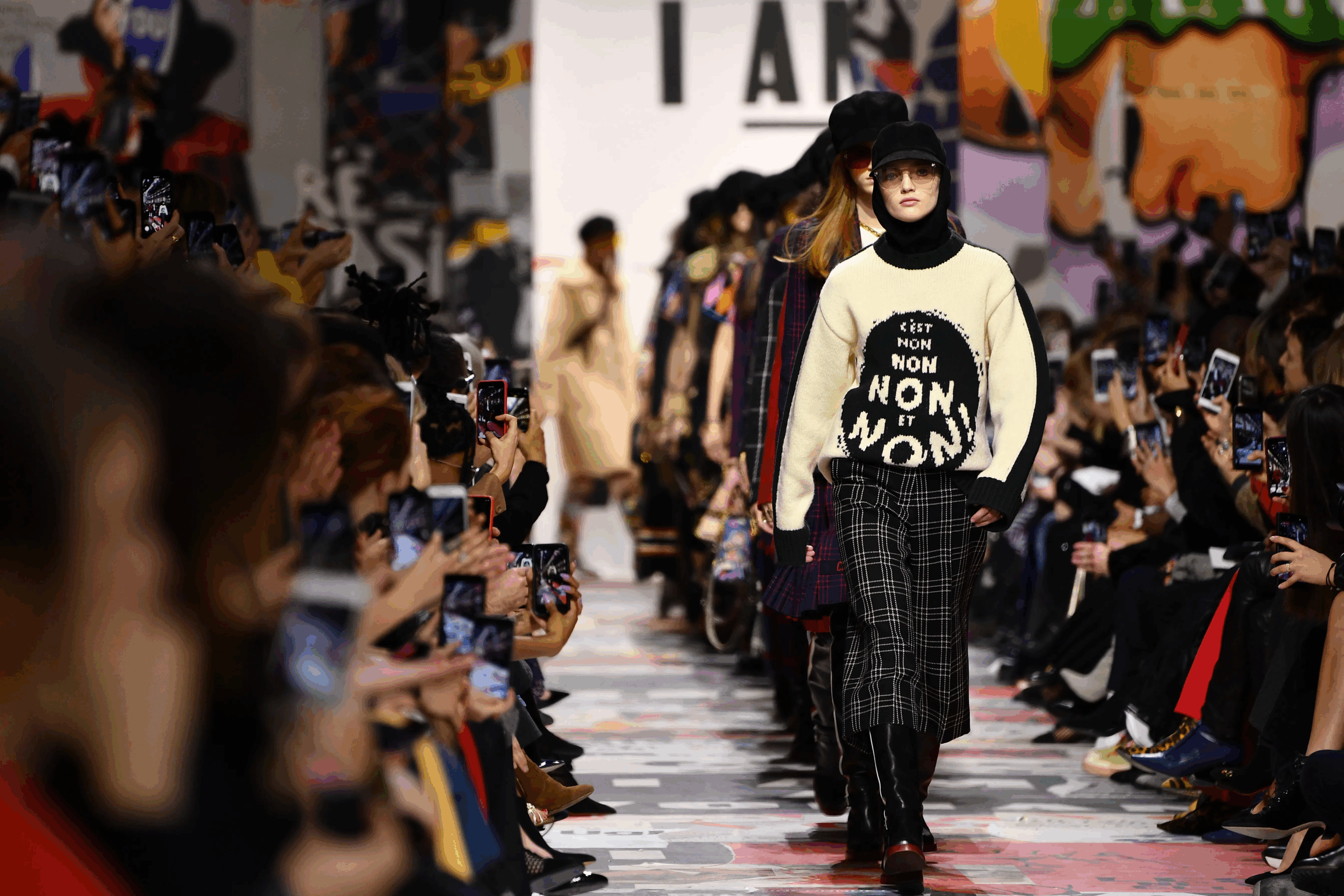  Fashion becomes a platform for advocacy as the runway introduces the powerful message of feminism through bold statements like Chiuri’s iconic t-shirt designs.